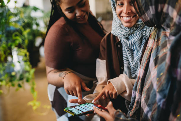 istock Three friends are ordering some food with a delivery mobile app 1716767221