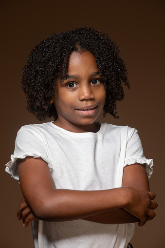 Studio portrait of a  beautiful black female child with natural afro hair