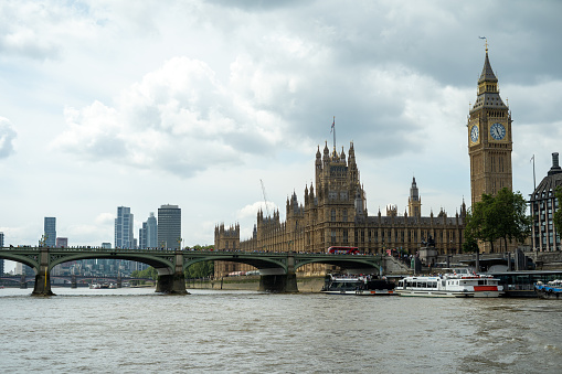 View of Westminster Bridge over the River Thames with Big Ben and the Palace of Westminster, home of the UK Parliament in London.