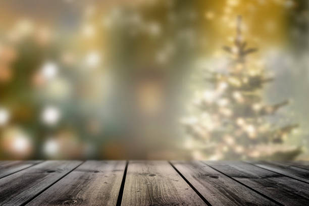 istock Blurred background with bokeh effect and wooden table in foreground 1716798230