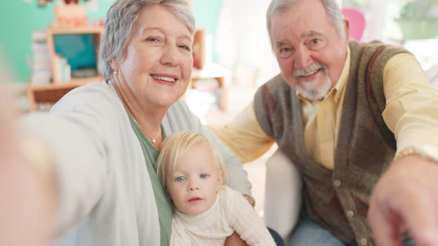 Selfie, love and elderly couple with their grandchild bonding, playing and spending time at home. Happy, smile and portrait of senior man and woman in retirement taking picture with girl kid in house
