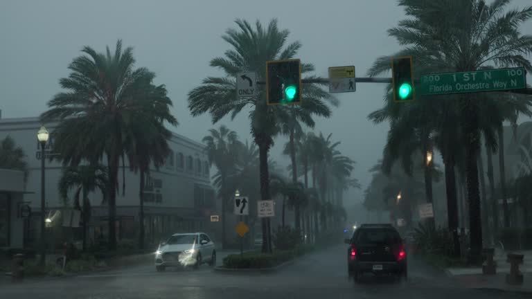 Storm rains on St. Petersburg, Tampa. Streets and cars flooded in Tampa Bay after hurricane