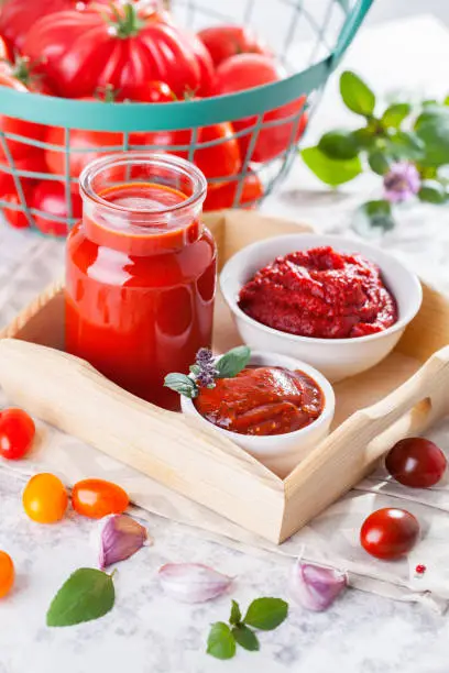 homemade tomatoes in glass jar - food and drink