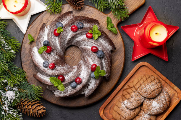 istock Christmas cake with blueberries, cranberries and mint 1716922373