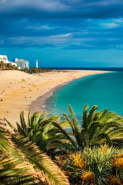 Morro Jable, Fuerteventura, Spain. Breathtaking beach Playa del Matorral in the rays of the sunset. Morro Jable and Playa del Matorral, Fuerteventura, Canary Islands, Spain, Atlantic, Europe