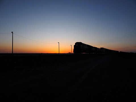 Freight train at sunset