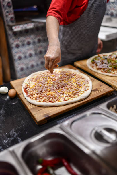 istock Last Minute Pizza Seasoning In Restaurant 1716972212