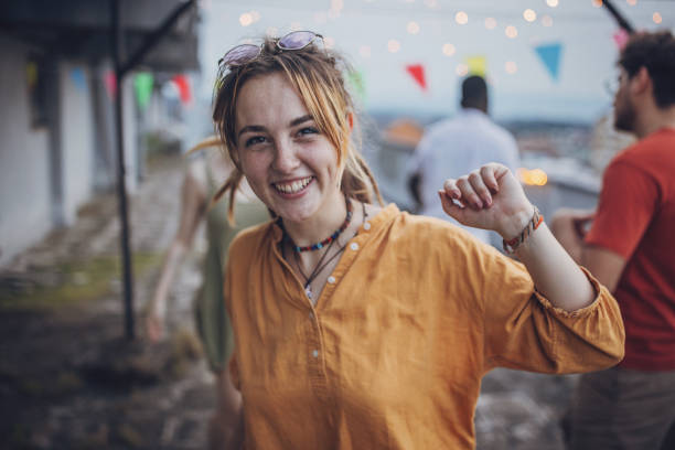 istock Woman dancing on party 1716973899