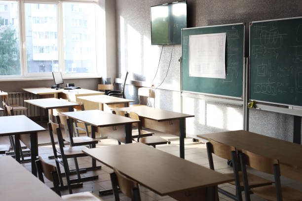 istock Lecture room with empty seats Business seminar education 1716977418