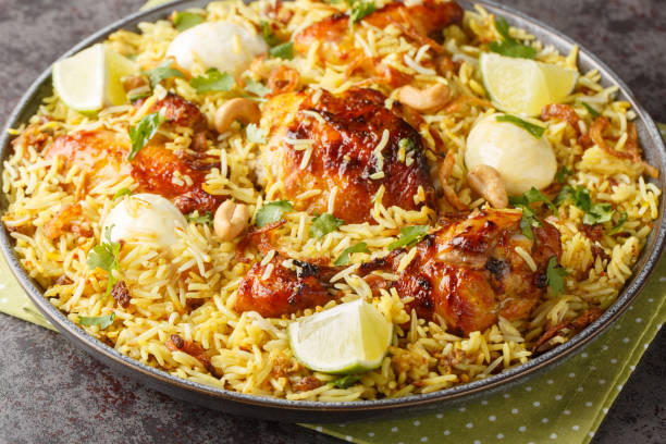 istock Chicken pulao or Polao with fried onion, egg, nut and raisins closeup on the plate. Horizontal 1716978549
