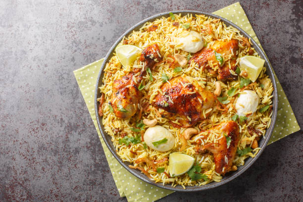 istock Chicken pulao or Polao with fried onion, egg, nut and raisins closeup on the plate. Horizontal top view 1716978596