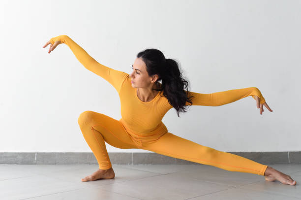istock Side Lunge pose variation or Skandasana 1716980236
