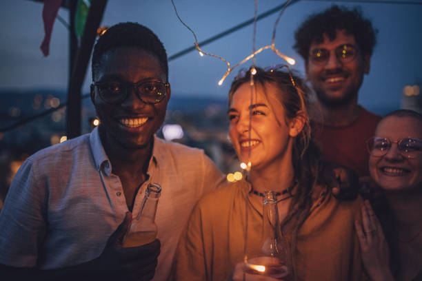 istock Friends on rooftop party 1717001577