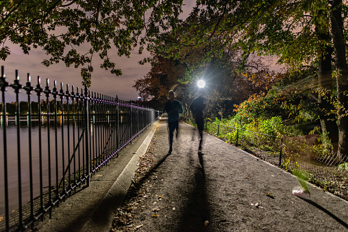 Running at night in Central Park Manhatten