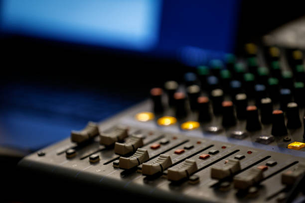 istock Detailed photo with knobs on a audio mixer desk soundboard 1717020254