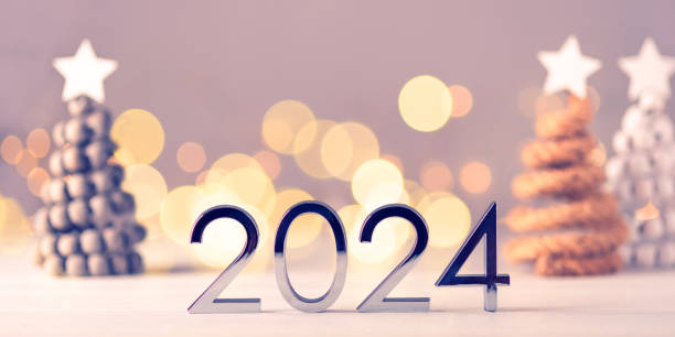 istock Metal numbers 2024 on table with bokeh lights. 1717033057