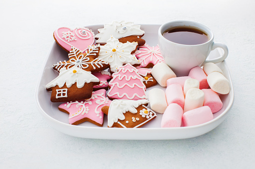 lovely pink gingerbreads on white background - Christmas time