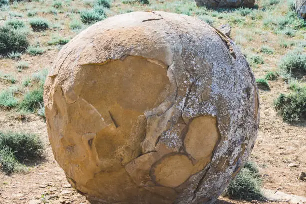 Photo of Unusual spherical shape of stones in the Kazakh steppe Mangistau, valley of balls in nature Torysh