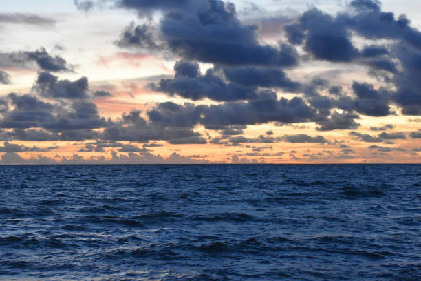 istock Sunrise over the sea, beautiful cloudscape 1717061501