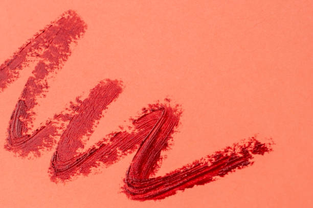 istock Brush strokes of paint on white background, lipstick marks on paper 1717071987