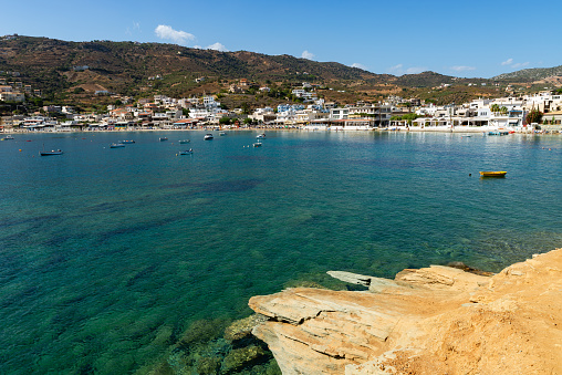 Beautiful clear beach on a sunny day in Agia Pelagia, Crete, Greece.