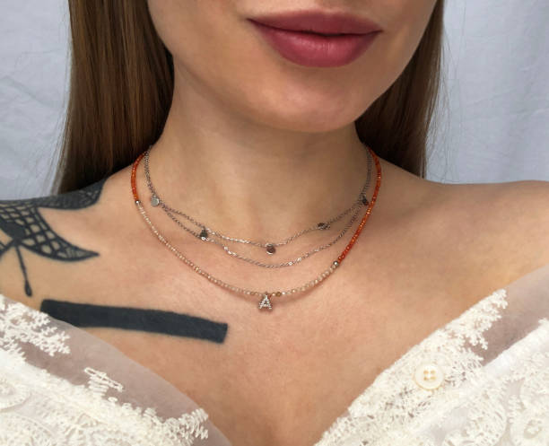 istock Portrait of a young woman in unusual massive necklace 1717103708