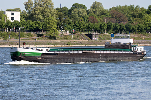 inland general cargo vessel shipping on the river Rhine