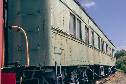 Railcars on tracks along California Route 99 near Bakersfield, California, USA