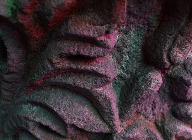 This is a hand painted abstract background with shades of purple as the main color. There is some  black grunge texture on the upper half of the painting and accents of green throughout.