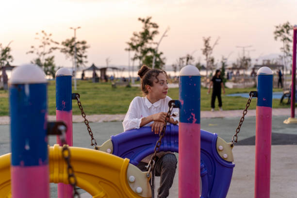 istock Girl playing in the playground. 1717154511