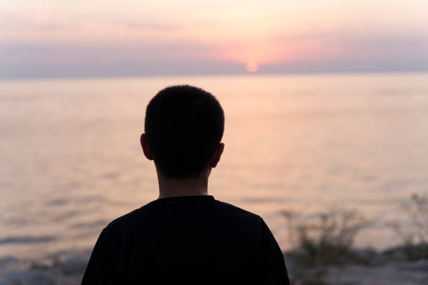 Portrait of a boy at sunset.