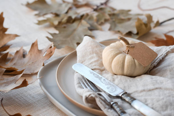 istock Plate with pumpkin and autumn leaves decorated for Thanksgiving dinner 1717162608