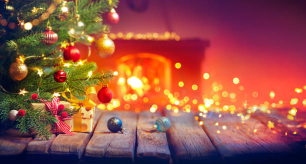 istock Gift Under Christmas Tree With Baubles In Home Interior With Fireplace And Bokeh 1717174801