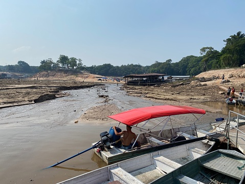 Improvised bridge over dried out part of Rio Negro in Marina do Davi in Manaus