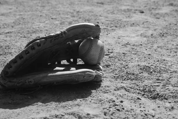 istock baseball glove on field 1717239928