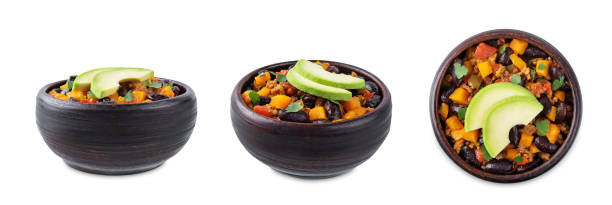 Pumpkin Chili con carne in a bowl on a white isolated background