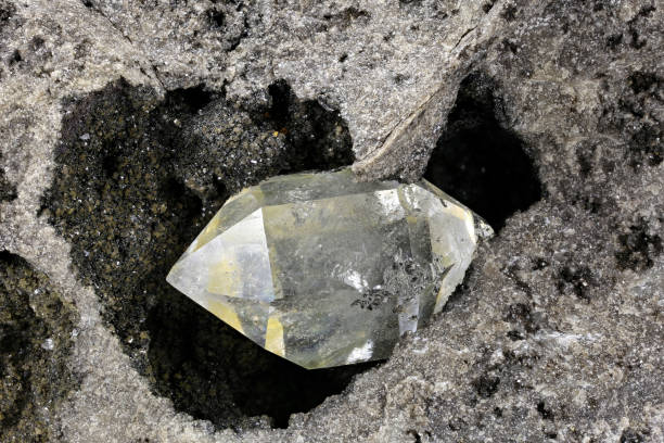 Herkimer diamond nestled in bedrock