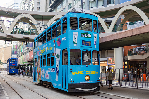 Hong Kong - October 4, 2023 : Double-decker trams at Causeway Bay in Hong Kong. Hong Kong has the world's largest operating fleet of double-decker trams.