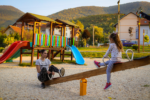 Mother and child playing in the park in Sokobanja