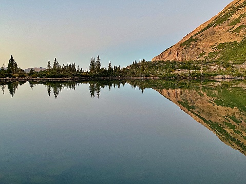 The High Uinta Wilderness in Utah is a prime destination for horse back riding, backpacking, fishing, and hunting, with amazing views of high peaks and shimmering lakes.