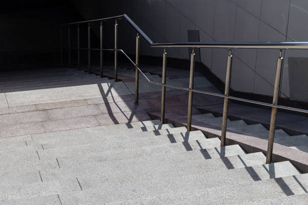 istock staircase descending into an underground passage without people 1717366480