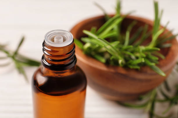 istock Bottle with essential oil against blurred background, closeup. Space for text 1717382457