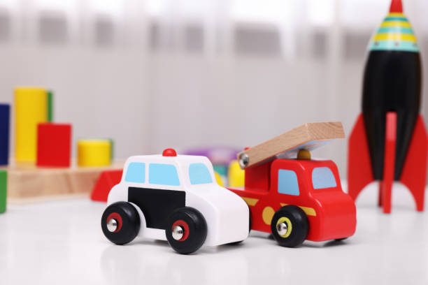 istock Different toys on white table in kindergarten, closeup 1717415681