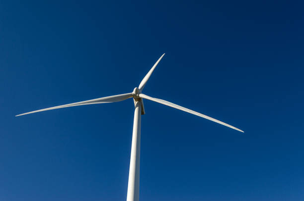 istock Wind turbine with a blue sky. 1717454197