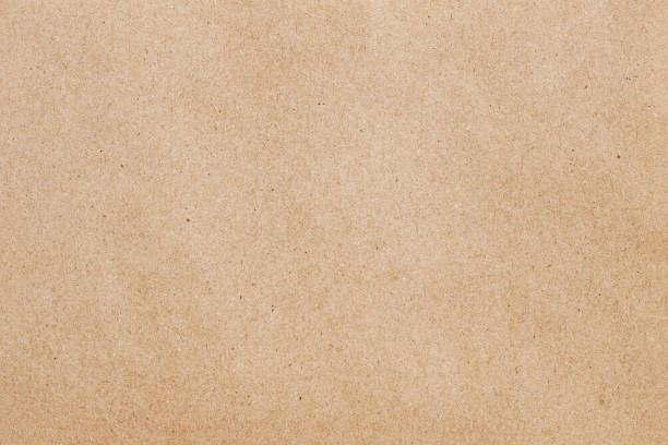 istock Texture cardboard background close-up, craft paper surface 1717457569
