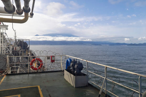 istock View from deck of a merchant tanker ship to the shore. 1717464472