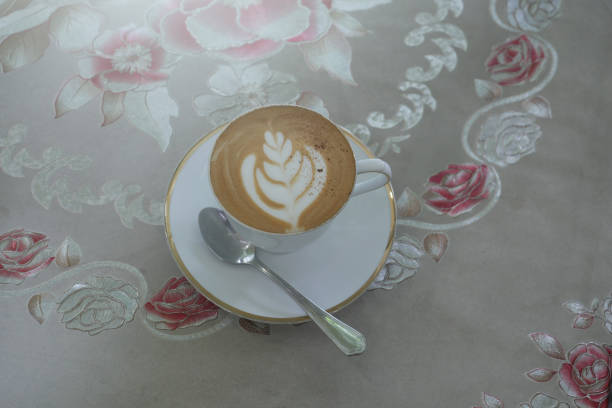 Latte Art Hot coffee in nature background.