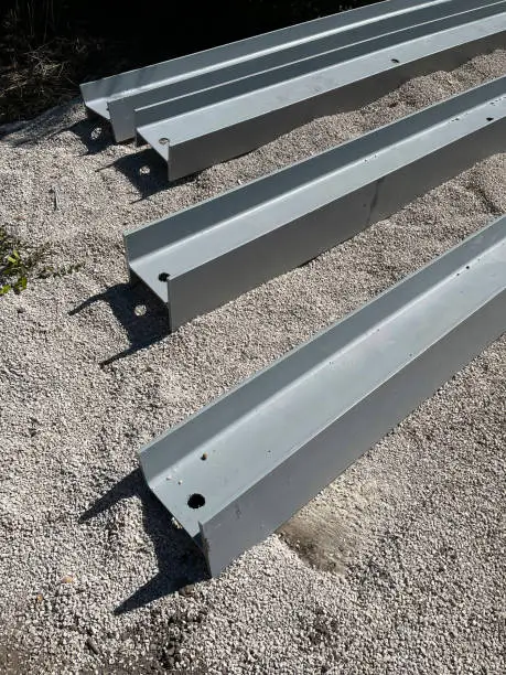 Double-T steel beams for landscape retainer walls