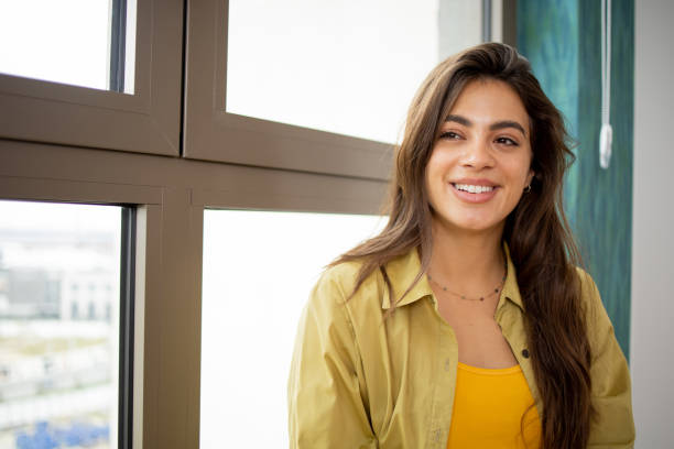 istock Happy young woman 1717572149