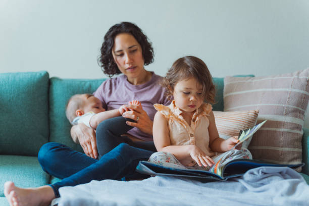 istock Mother with two young children spending time at home 1717574442